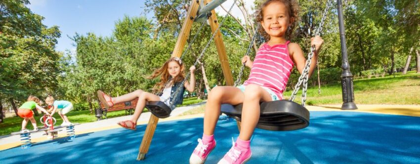 Kid-On-Swings - Custom Park Surfacing kids on swings